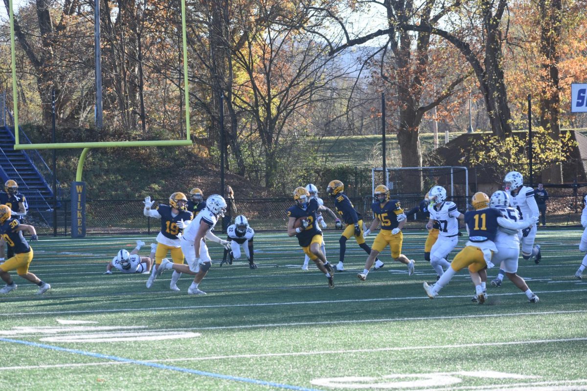 Sr. Zane Grover takes a punt return in Wilkes' victory over Moravian 47-28 on Nov. 16.