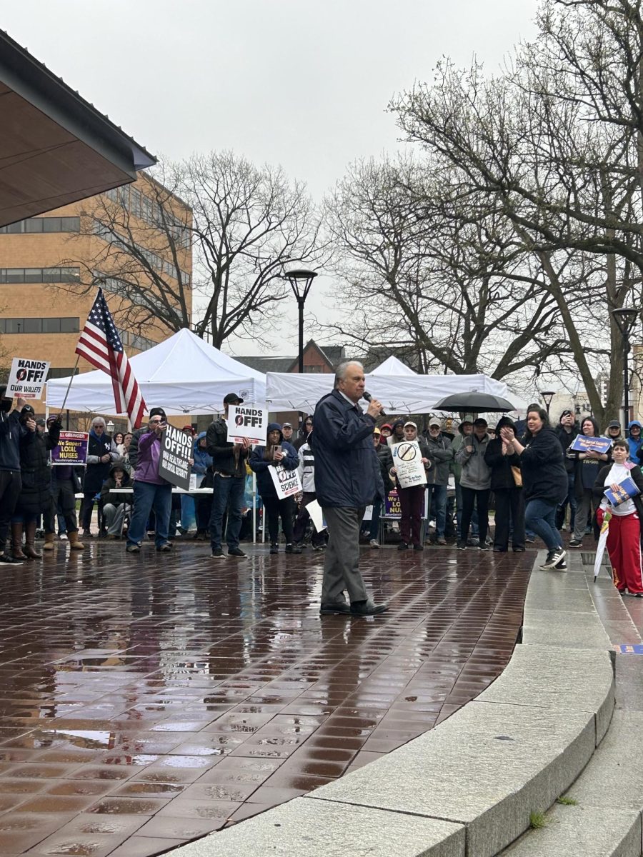 State Rep. Eddie Day Pashinski addresses the crowd at the Wilkes-Barre "Hands Off!" protest.